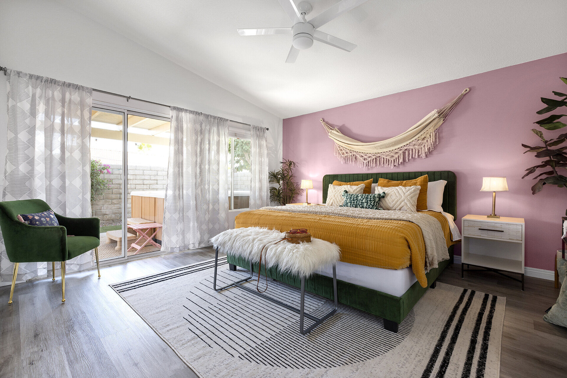 Private pool area with lounge chairs and desert views